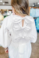 charming white bow knot cutout blouse